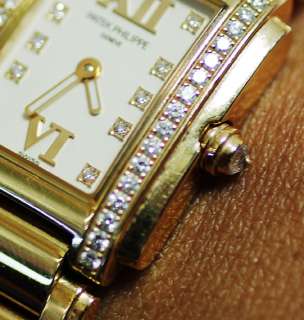Patek Philippe Ladies 18k Gold 4908/11R with Diamonds in Bezel