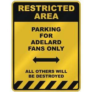  RESTRICTED AREA  PARKING FOR ADELARD FANS ONLY  PARKING 
