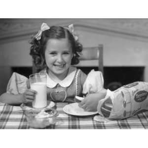  Young Girl Eating Bread and Drinking Milk Photographic 