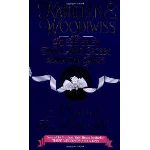   at Midnight [Mass Market Paperback]: Kathleen E. Woodiwiss: Books