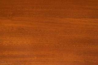 The mahogany displays a rich complexion and a pronounced grain.