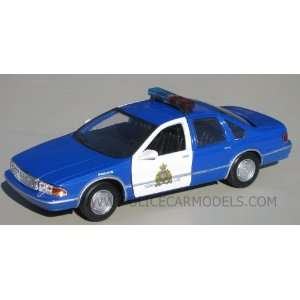    Motormax 1/24 RCMP 1993 Chevy Caprice Police car: Toys & Games