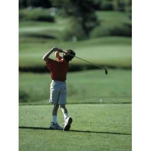  Young Boy Playing Golf, Breckenridge, CO Photographic 