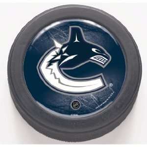 NHL Vancouver Canucks Hockey Puck:  Sports & Outdoors