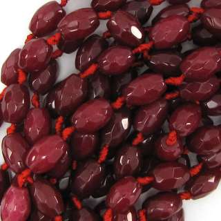 Faceted ruby red jade barrel beads. This strand is 15 long, about 