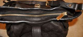 This auction is for a Louis Vuitton Mahina Leather handbag. The color 
