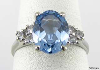 BLUE TOPAZ RING   3.5ct oval 10k White Gold Diamonds  