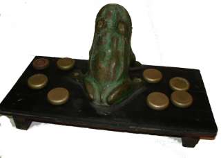 Old bronze toad frog typical Argentine game JUEGO SAPO  