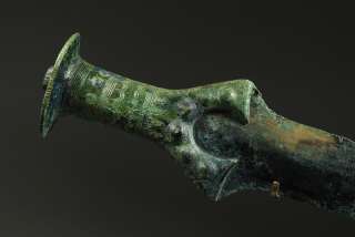 An Important European Bronze Age full handled sword, with scabbard 