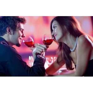  Young Couple Celebrating with Red Wine at Restaurant 