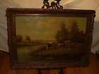 Large antique oil painting,{ Cows grazing by the river, signed T. Ooms 