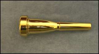 This heavier gold plated trumpet mouthpiece (5C) darkens the sound 