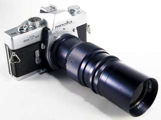Minolta SRT101 Film Camera with Lentar 200mm F 4.5 Lens  