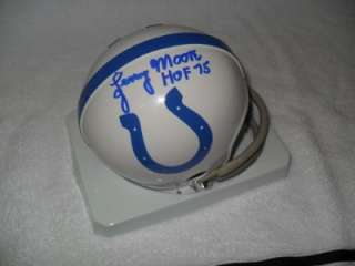 Signature is hand signed on an official Riddell mini helmet. The 