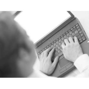  Caucasian Business Man Typing on Black Laptop Computer 